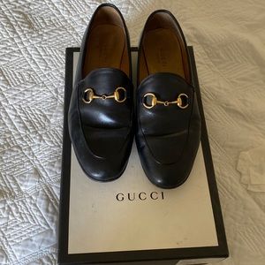 Gucci black lloafer.